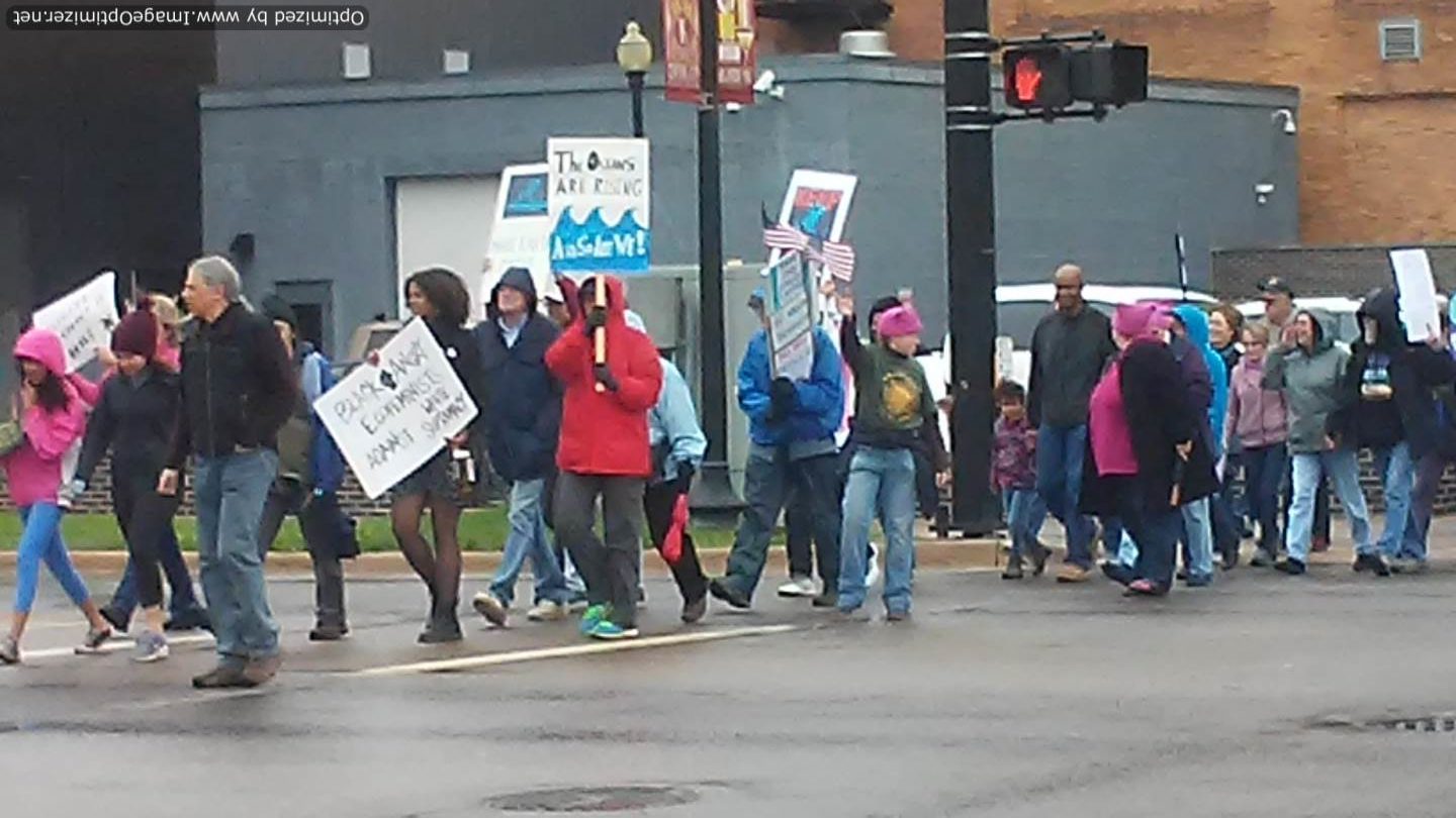 Activists in downtown Kalamazoo, MI at 2017 People's Climate March